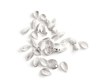 x 50 sheets, 7mm mini charm, silver plated brass