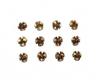 12 Swarovski Beadcaps- Citrine/Gunmetal