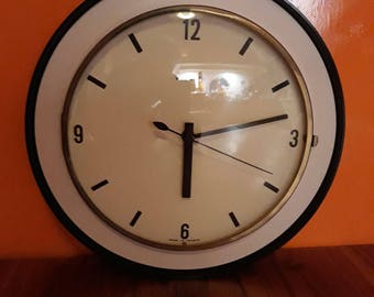 Featuring vintage wall clock