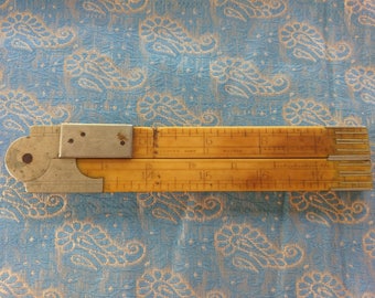 J Rabone & sons makers folding bone and Silver ruler 24"