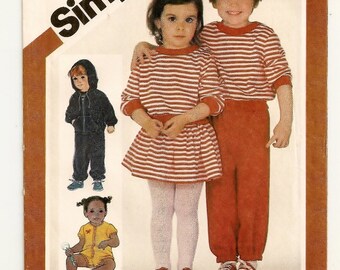 A Romper, Mini Skirt, Pullover Top, Pull-On Pants, Panties & Hooded Jacket Pattern for Toddlers: Uncut - Size 2 Breast 21" • Simplicity 5778