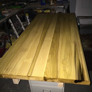 Floating Poplar table, showcasing the variation of this beautiful grain, making it pop using rubbed in linseed oil, polished with Bees wax.