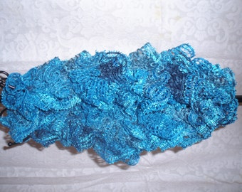 Ruffled infinity scarf in light teal