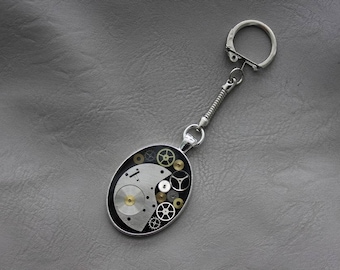 Key-shaped oval Steampunk watch parts and resin