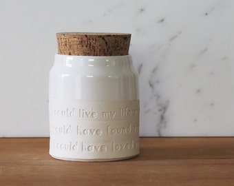 urn on collared shape. Optional quote shown. your choice of size, clay, glaze, text, and stamp options. urn for ashes or pet urn.
