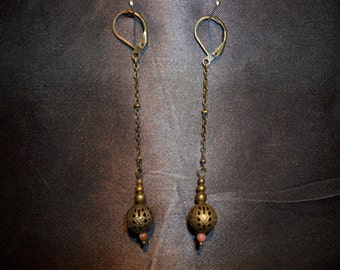 "scourge of weapon" and rhodonite earrings