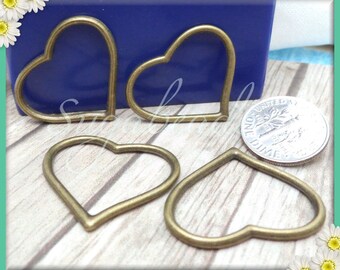4 Elegant Brass Heart Connectors or Pendants 28mm