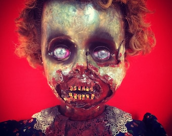 Dee Sgusting is a OOAK zombie baby art doll