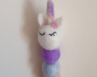 A unicorn inspired hanging decoration