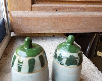 Celadon boxes with green spots and scratch on the stopper