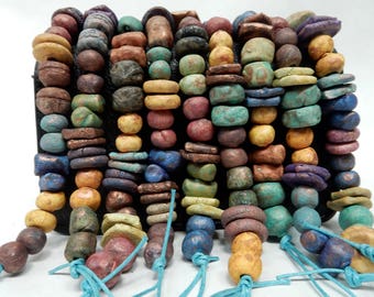 22 Assorted stoneware clay beads appropriate for earrings BEST SELLER…. NO 667.