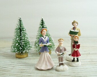 Avon Christmas Family Carollers with Flocked Bottle Brush Trees - Vintage Christmas Village Display, circa 1980s - 6 Pieces