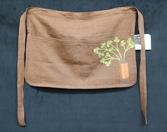 Linen half apron in potting soil brown with cilantro applique