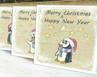 8 Christmas cards ' Merry Christmas & Happy New Year '. Penguin.