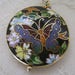 Vintage cloisonne butterfly pendant, multi-colored against black background