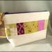Zipper cosmetic bag handmade with unique patchwork. Fully lined. Padded for structure.