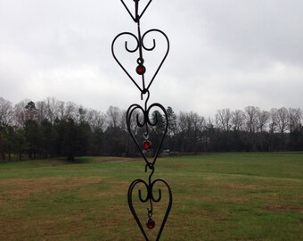 Four Metal Hanging Hearts