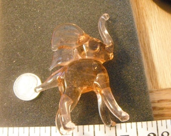 Pinkish/Orange-ish Hand Blown Glass Little Elephant Figurine, 2 1/2in x 3in.