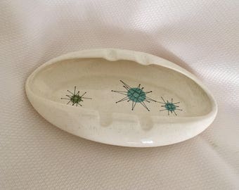 Franciscan Starburst Atomic Ashtray. Iconic and extremely rare. This beautiful Starburst Ashtray has not been used, No stains, no odors Mint