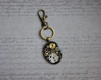 Key-shaped oval Steampunk watch parts and resin