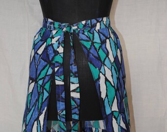 Blue, white and green apron 1950