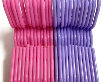 18 inch Doll Hangers 12 Pink & 12 Lavender Hangers - 2 Dozen to fit 18” inch dolls Free Shipping These are 7 1/4 inches wide.
