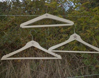 3 wood hangers taupe color old patina