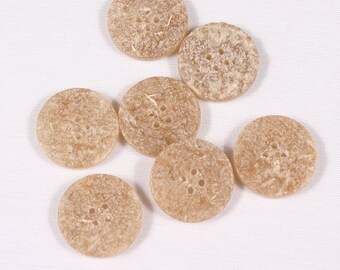 7 buttons 28mm, resin, beige, 4 holes (3497)