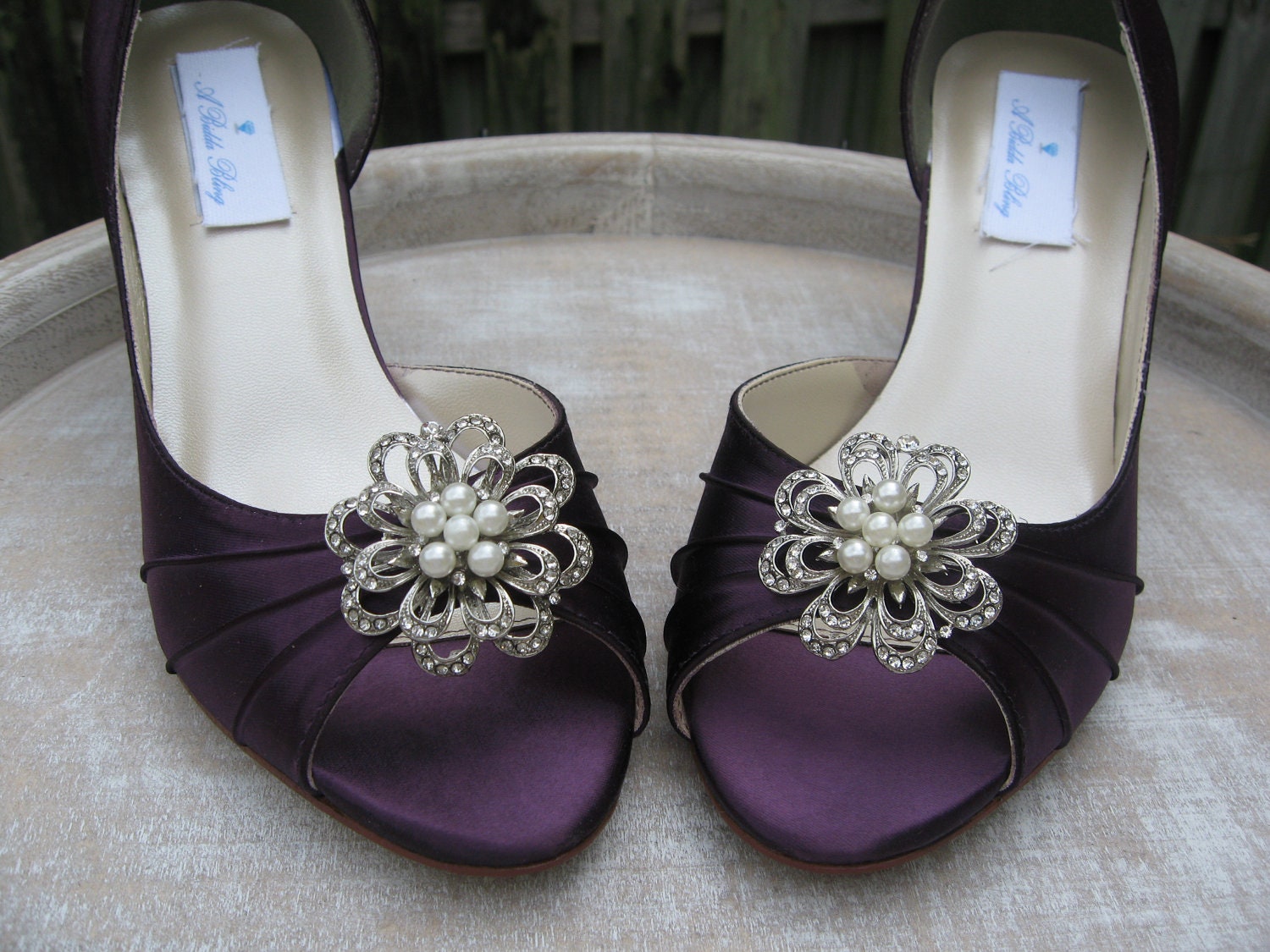 Purple Wedding Shoes Purple Bridal Shoes Eggplant Bridal Shoes These vintage inspired eggplant purple shoes have been hand dyed and then embellished with a vintage style pearl and crystal brooch. Perfect for your wedding da