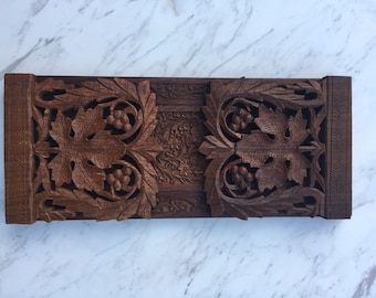 Ornate carved wood bookends