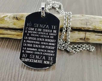 Stainless steel pendant with engraved sentence. 30 x 50 mm