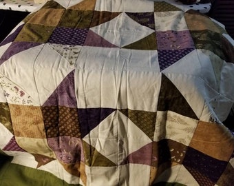 76" x 76" lavender and sage star quilt.