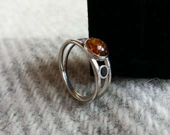 Silver ring with amber stone