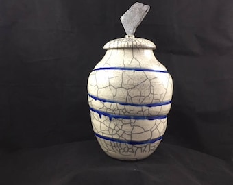 Raku urn with stone finial