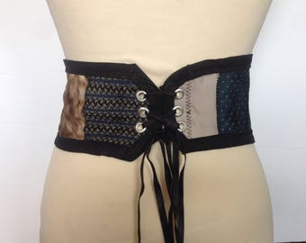 One of a kind upcycled silk tie corset style belt. Free shipping within Canada!