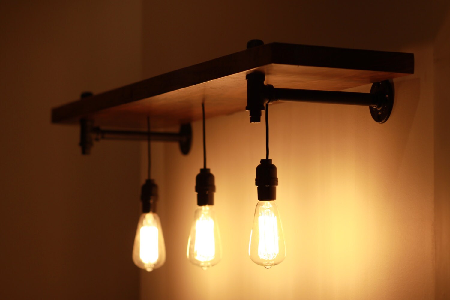 Rustic Wood And Pipe Shelf With Pendant Lighting Rustic Wood And Pipe Shelf With Pendant Lighting
