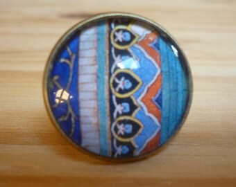 Bronze ring with glass cabochon, colorful picture