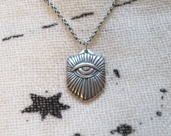 Silver mystical eye pendant