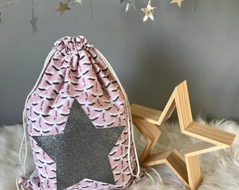 Bag has star spangled anthracite swallows pink floral fabric and white with black polka dots