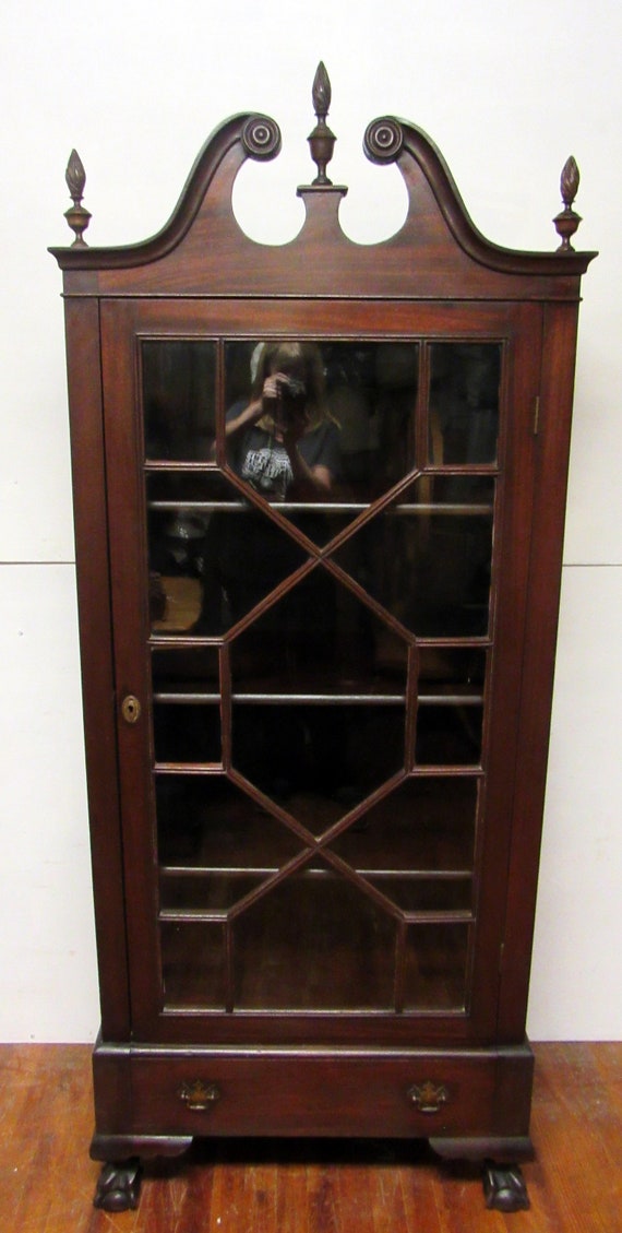 Mahogany bookcase with glass doors and sides