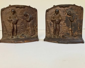 Arts and Crafts cast iron bookends