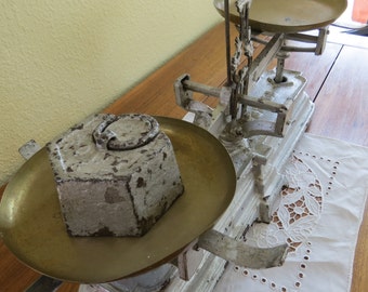 Antique Cast Iron Scale from Germany. Silver cast iron with 2 brass pans, "Force" "15 KILOG" kilograms on base. Comes with refashioned arm.