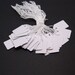 Set of 38 price tags on white cardstock, 29 x 18 mm - end of STOCK