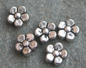 Silver tone flower spacers