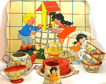 1940's tin toy tea set with Ducky Bath Time. Litho by Ohio Art Co. 22 piece set.