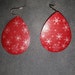 Snowflake on Red Background Oval Shape Pierced Earrings Brand New Handpainted