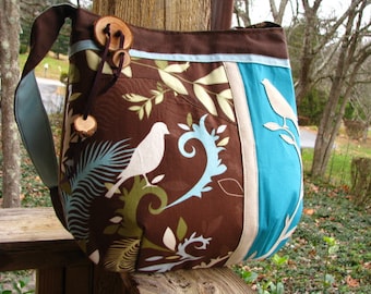 Bird Enchantment shoulder bag in blue and brown with adjustable strap and 6 pockets
