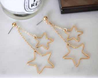 Earrings with dangling stars