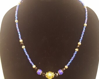 Purple/Blue Iridescent Seed Beads, Black Faceted Beads and Gold Accent Beads
