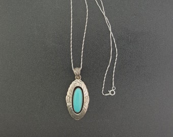Vintage Navajo Oval pendant - sterling silver - Kingman turquoise